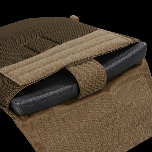 The Condor Gunner Plate Carrier features a partially open brown tactical pouch, revealing a black ballistic plate secured by Velcro—perfect for law enforcement or first responder EDC needs.